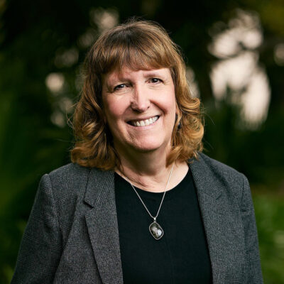 Colored Photograph of Unity Shoppe Board Member Cathy Macaulay